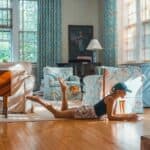 Elegant dining room with hardwood floors and large windows